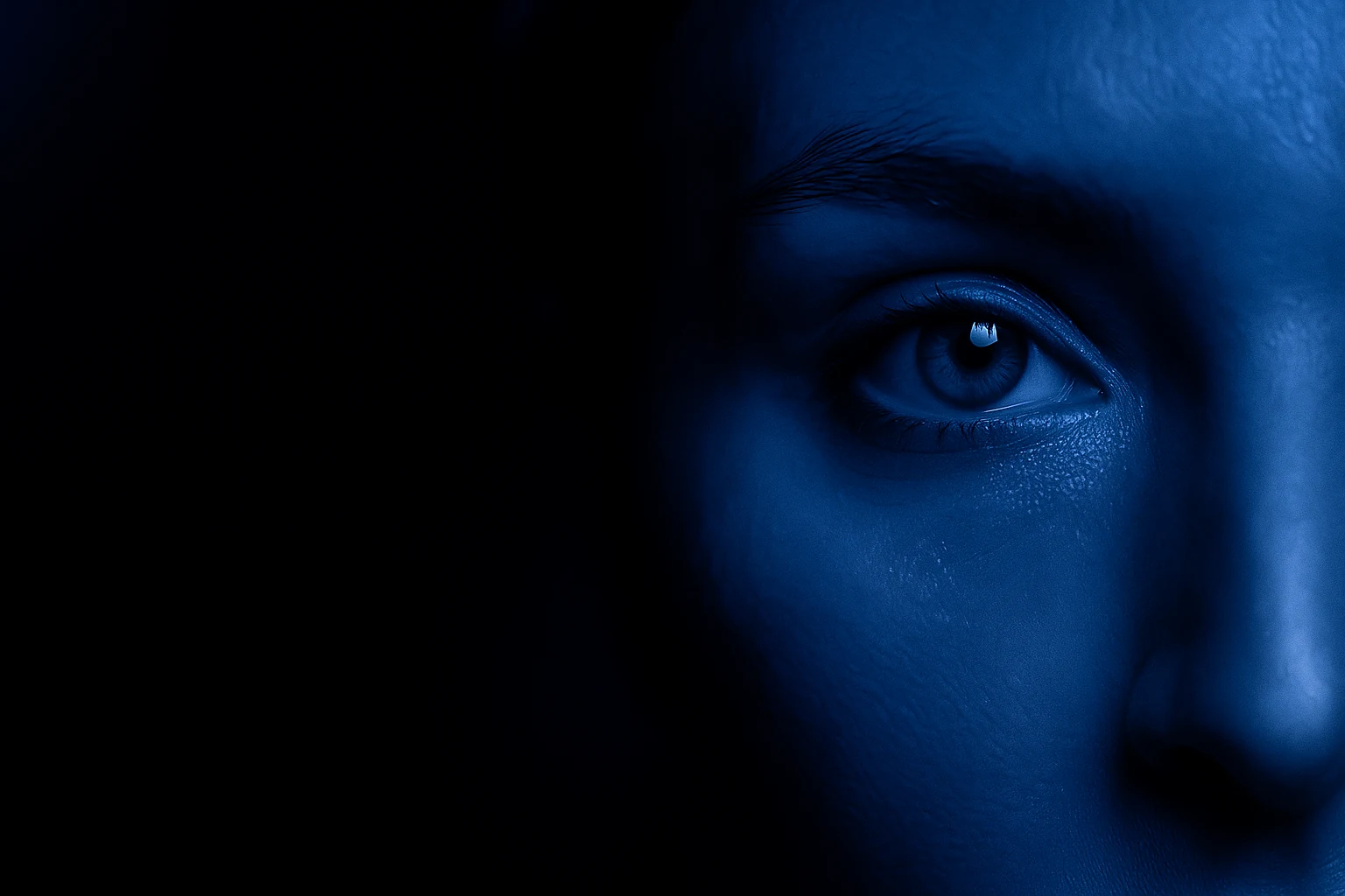 Detalhe de um olhar em tons de azul